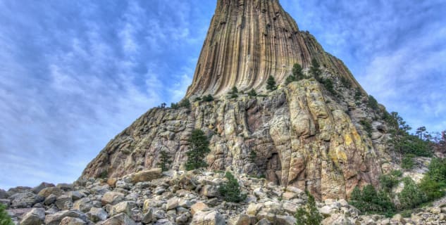 Devils Tower - https://www.flickr.com/photos/39908901@N06/9323082445/in/photolist-fcReAM-2PrGH-2PrGQ-fcPSKZ-YcoLgQ-eV6VHV-58k2mW-8ft5tK-eVijP5-eV6TDz-eV6UUF-HimXKk-fbkvog-hLnC81-eVii8o-qJYwxp-dHfN6y-WMsE2N-VELgnf-fy6iPS-feQuye-9E7N2v-VVsZii-f7HhVr-CkBpTJ-qcrwRQ-8QR93e-VkhSAj-eVifSE-eV6Rpz-eVieNf-4uqEhu-7viGwe-f7Hga4-oHKGGn-JTWoAL-Z8RmHt-ff5K5N-8ftjpw-eyBggA-pbBSad-fd5bEq-VEL9vu-VELcHS-4MfVsV-fxR4XR-gQeZ5m-VVsVAD-VELeu7-6Qi1n2