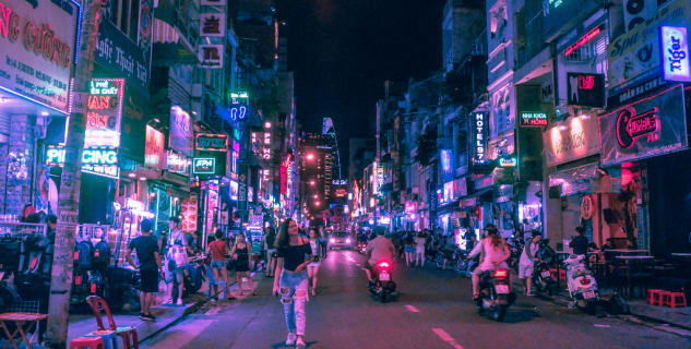 Bui Vien Walking Street - https://www.wallpaperflare.com/bui-vien-walking-street-woman-walking-in-the-middle-of-the-road-during-nighttime-wallpaper-zpank