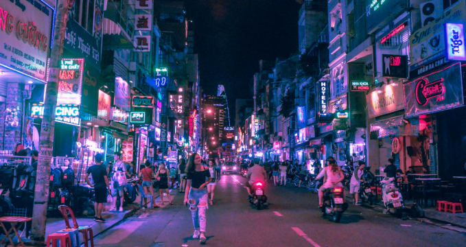 Bui Vien Walking Street - https://www.wallpaperflare.com/bui-vien-walking-street-woman-walking-in-the-middle-of-the-road-during-nighttime-wallpaper-zpank