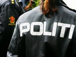 Politiet - logo på ryggen