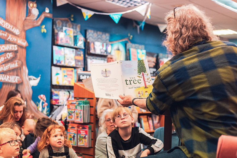 Neal Layton Illustrator at a Children's even reading The Tree picture book