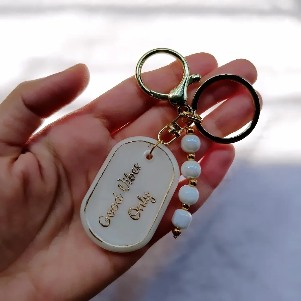 Handmade Resin Quote Keychain with Gold Accents and Beaded Charm