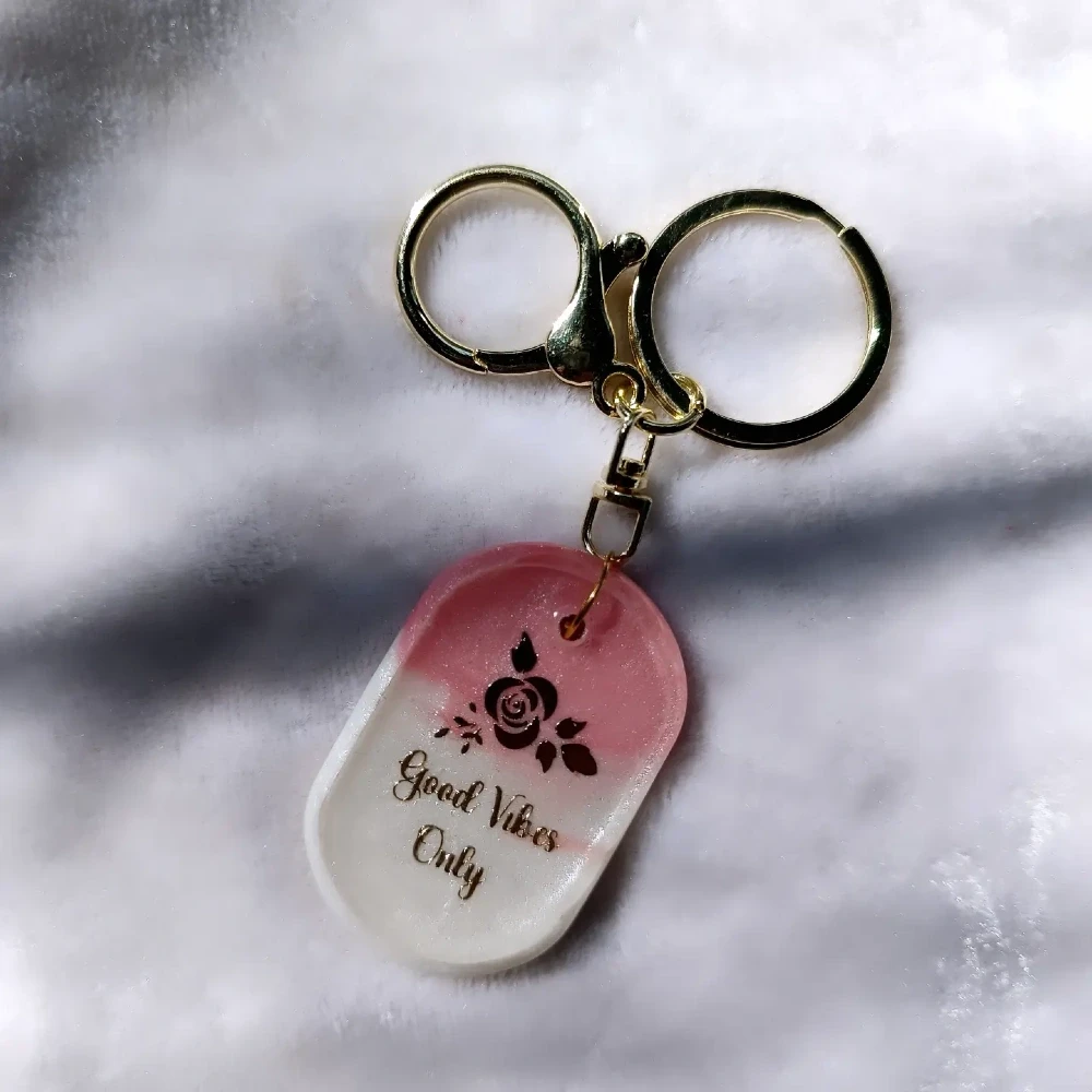 Handmade Resin Quote Keychain with Rose Silhouette and Gold Lettering