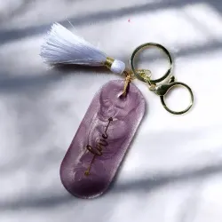 Handcrafted Resin Keychain with "Love" Arrow Quote & White Tassel Charm