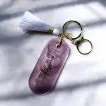 Handcrafted Resin Keychain with "Love" Arrow Quote & White Tassel Charm
