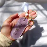 Handcrafted Resin Keychain with "Love" Arrow Quote & White Tassel Charm