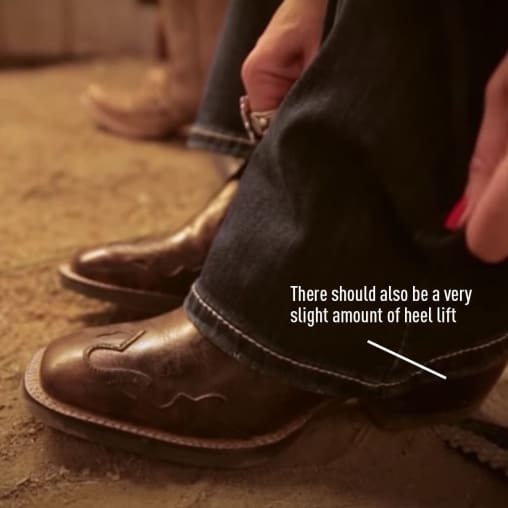 cowboy boots indicating heel lift