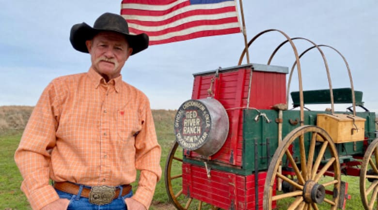 kent rollins standing in field
