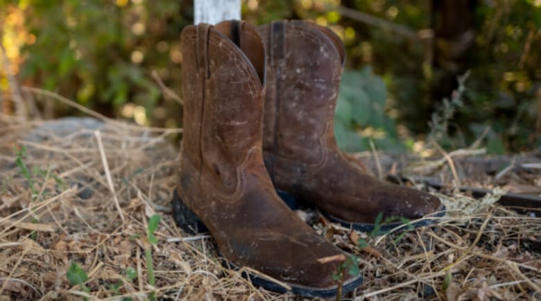 roper boots in grass