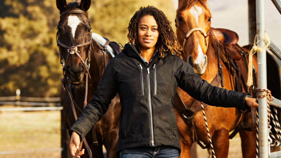 Brianna Noble with two horses