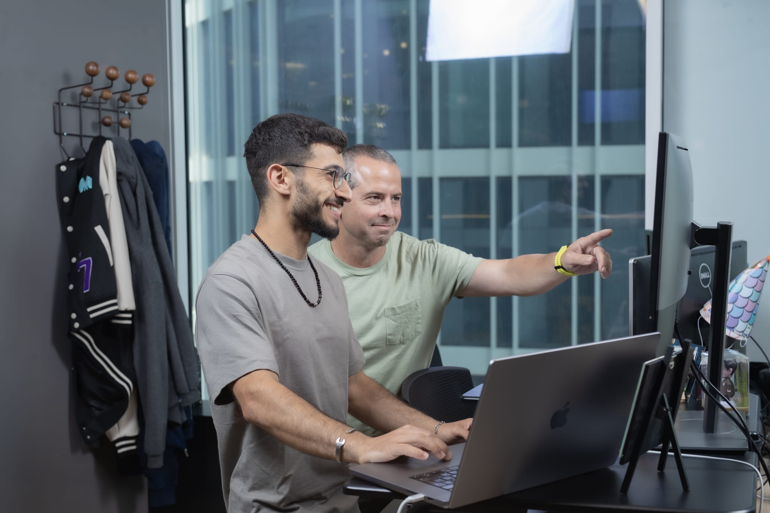 armis employees collaborating in an office