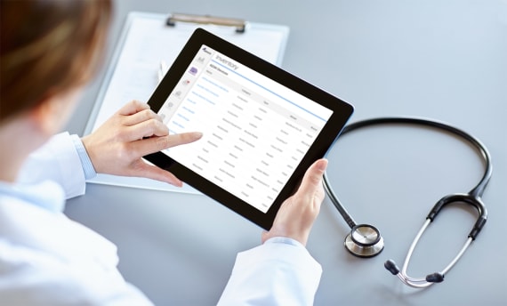 doctor with tablet