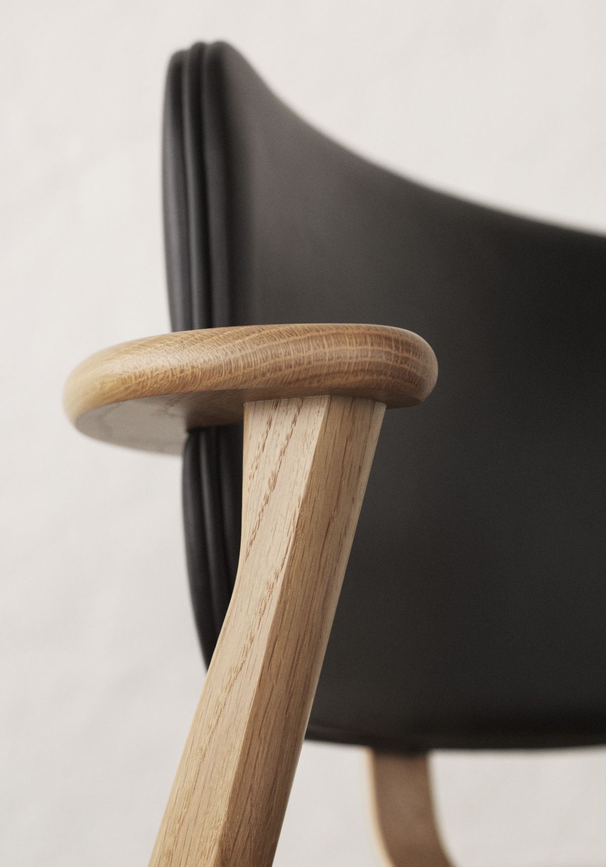 Domus Chair birch black leather upholstery - armrest detail