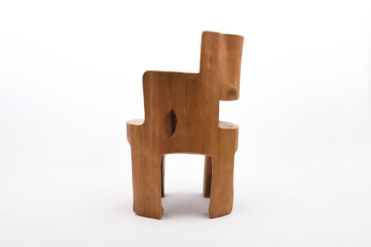 Anonymous huge wood chair side