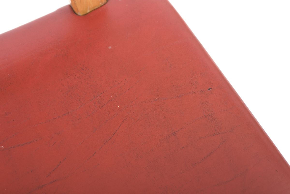 Anonymous red vinyl stool 06