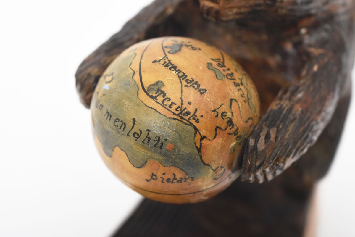 Anonymous bear squlpture with globe 02