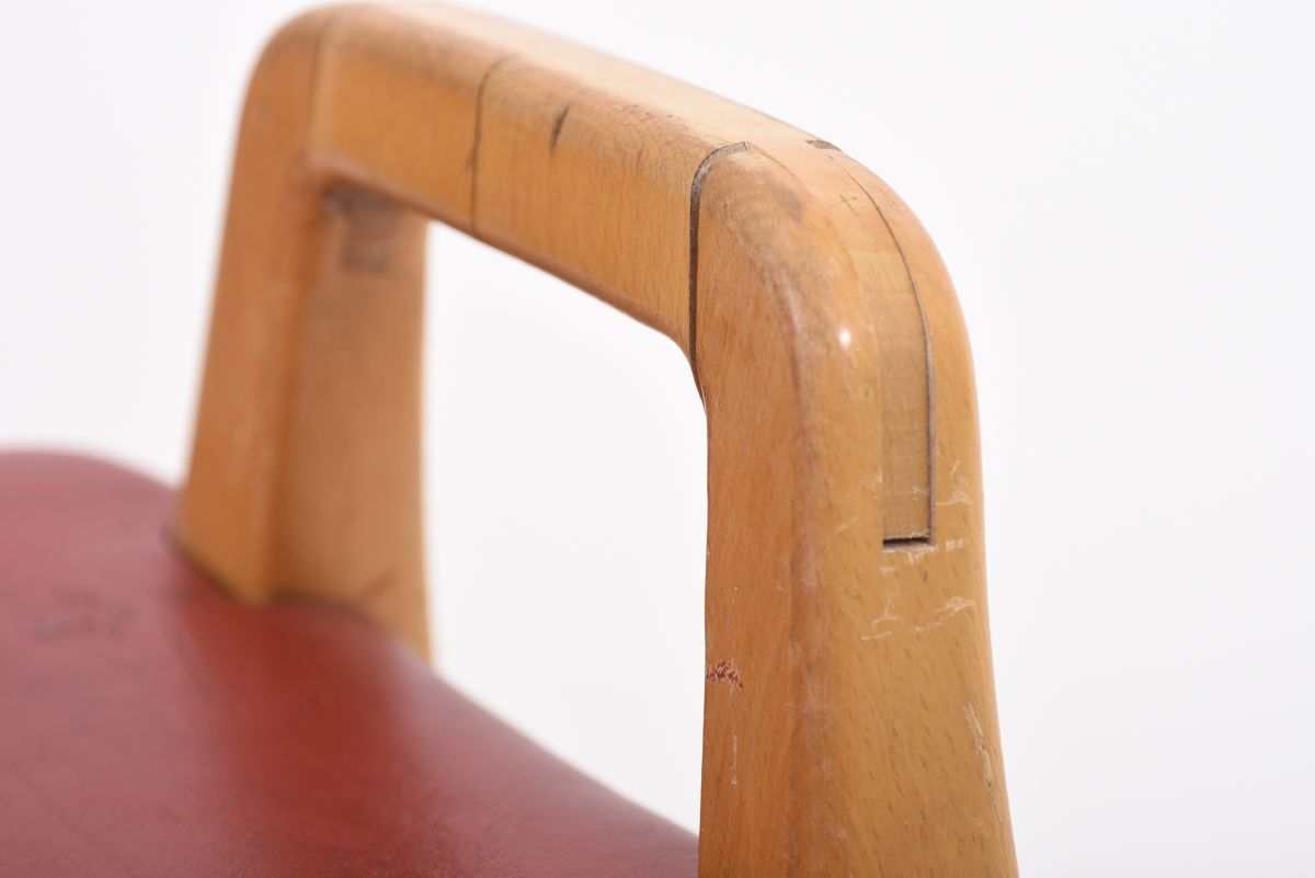 Anonymous red vinyl stool 02