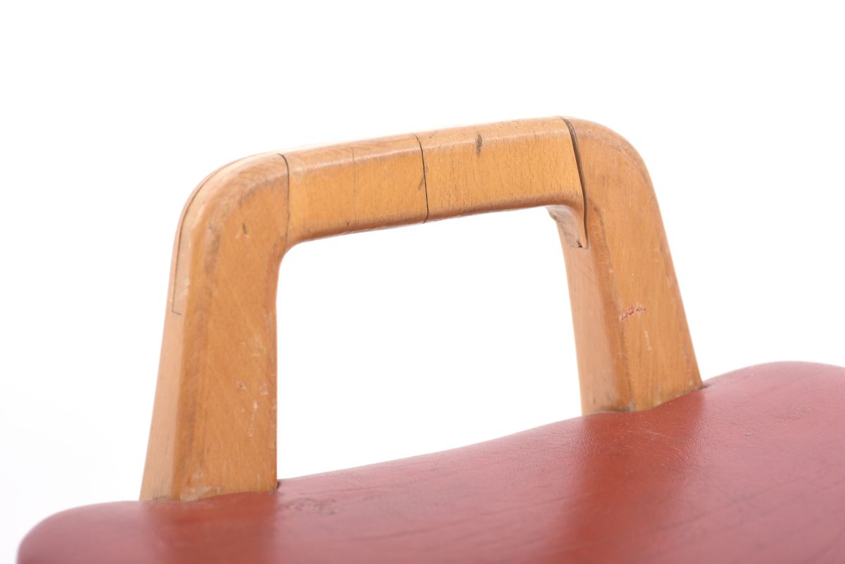 Anonymous red vinyl stool 01