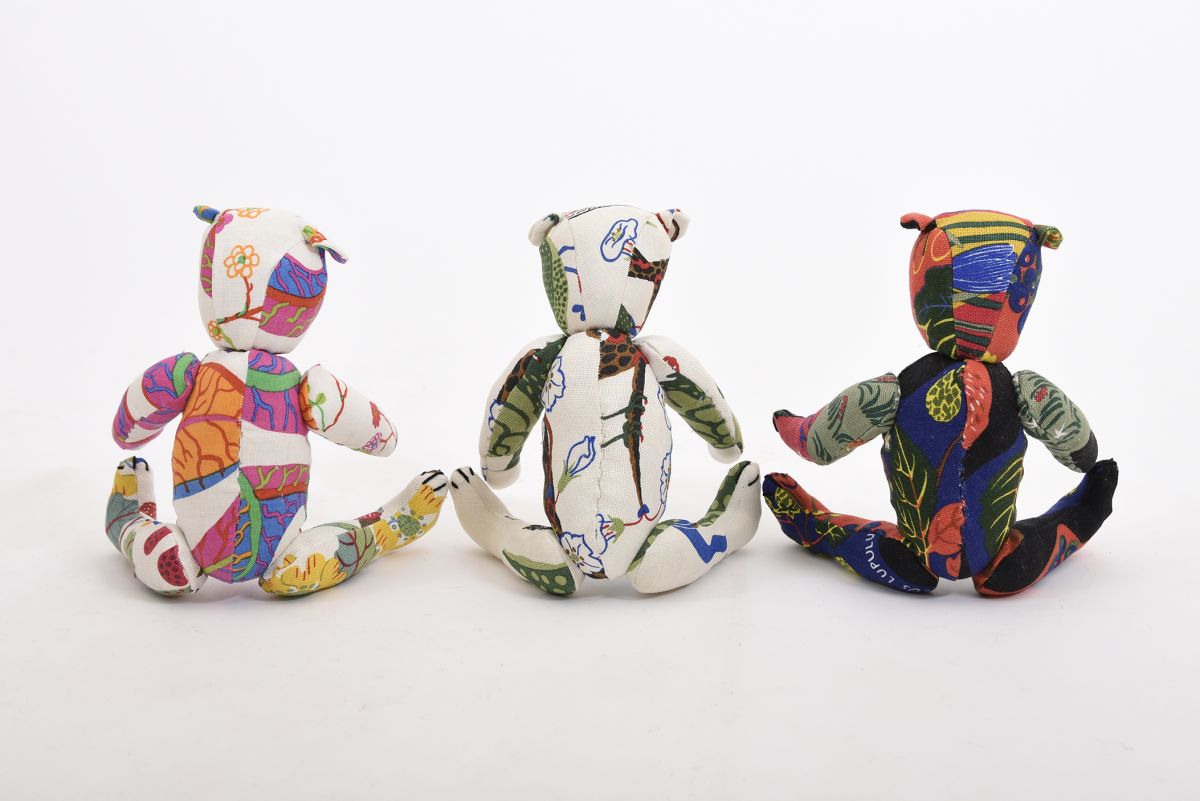 Anonymous Three traditional stuffed Teddy Bears back
