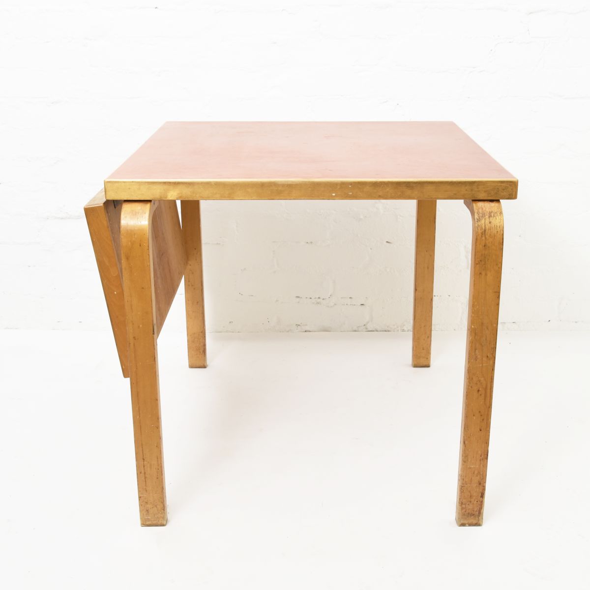 Aalto-Alvar-Drop-Leaf-Table-Red-Linoleum