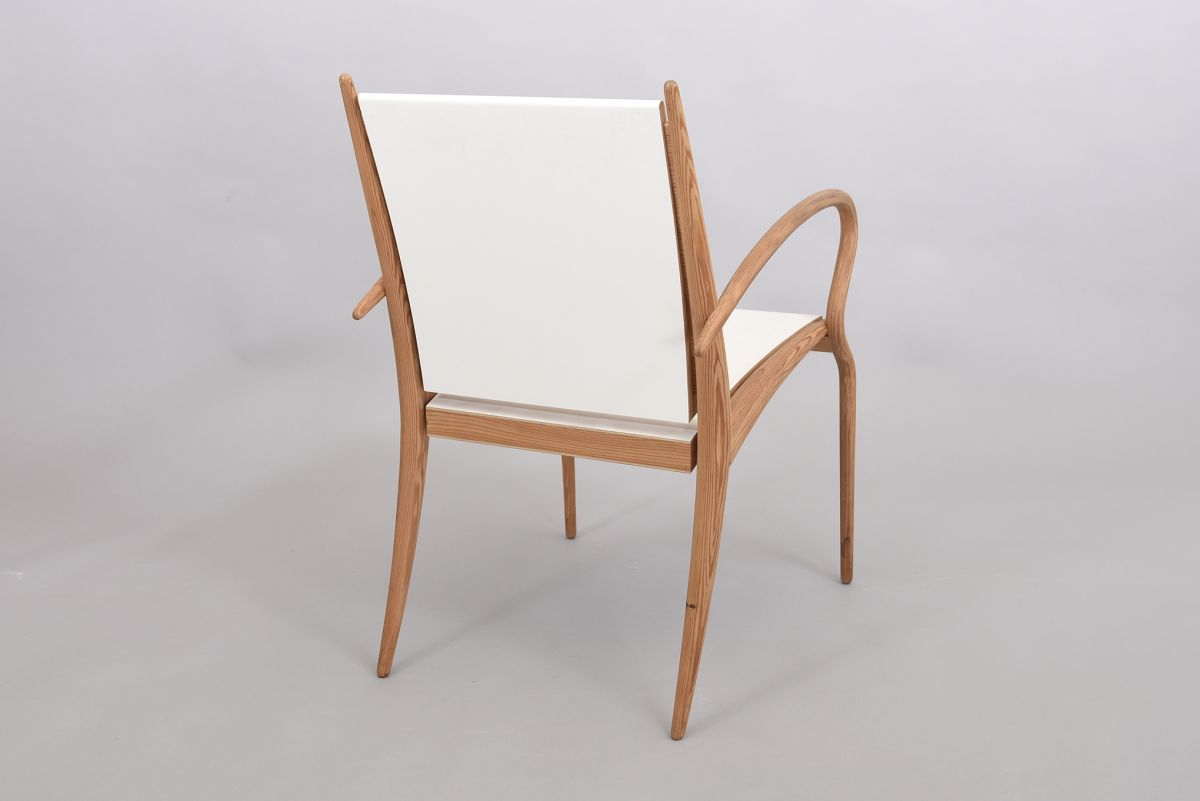 Anonymous curvey armchair back