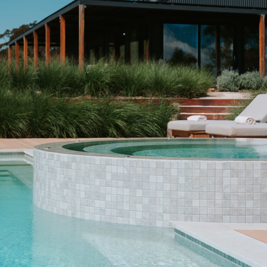 artisanexterior image upload c_limit,f_auto,w_1080 v1787891374 fragment_pool_and_olive_limestone_coping_8_riviera_pools_category_image From The Earth Collection