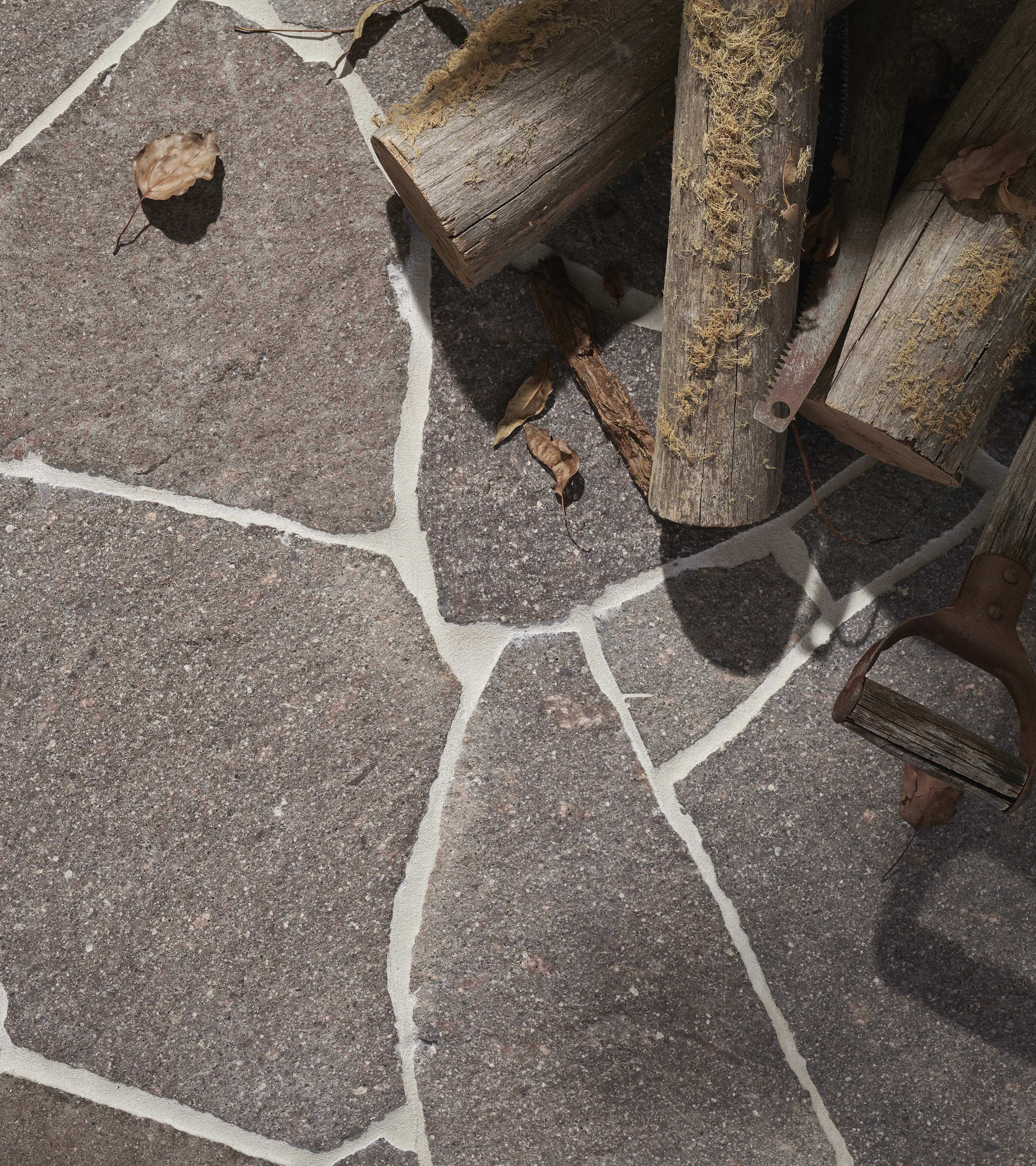artisanexterior image upload c_limit,f_auto v1777612665 artisan_exterior_porphyry_split_crazy_paving_hero_1_plqx16_eb8588