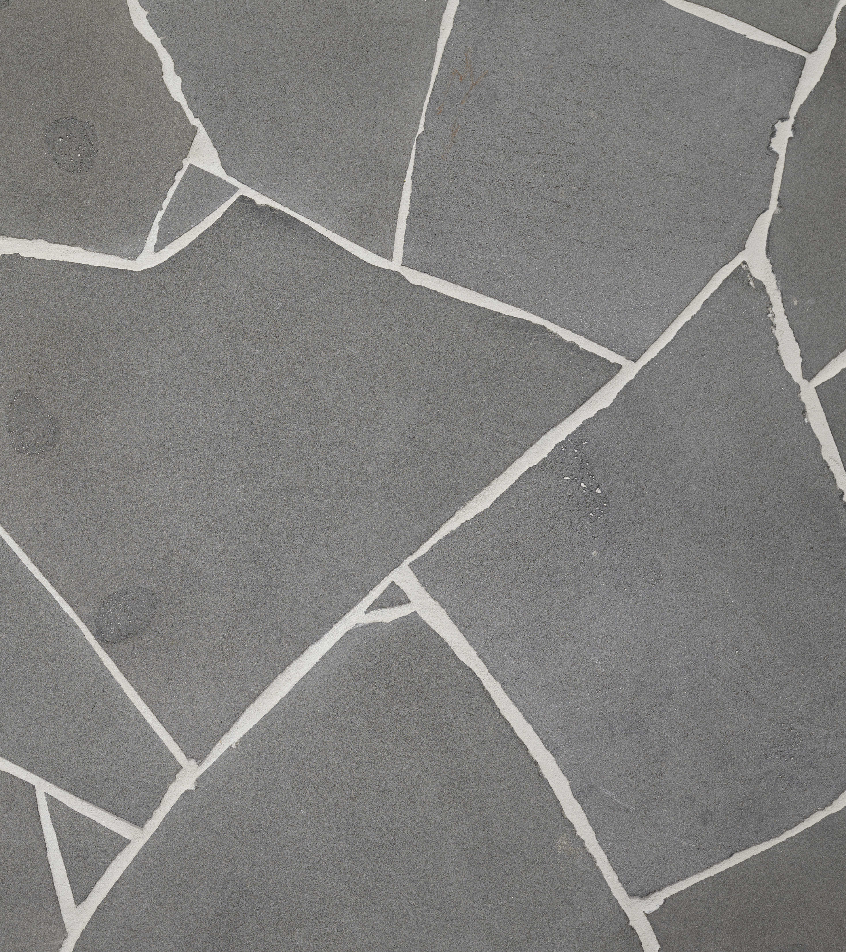 artisanexterior image upload c_limit,f_auto v1777691234 artisan_exterior_bluestone_20mm_crazy_paving_hero_ncdrmt_29e8f0