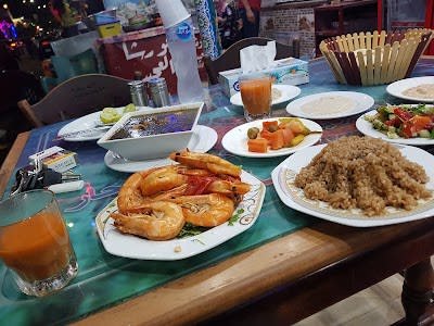 مطعم أبو رشا العجيب للمأكولات البحرية_80003