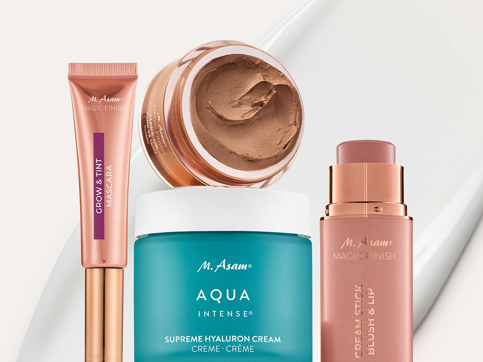 M. Asam Produktbild mit MAGIC FINISH Mousse, Mascara, Creme und Blush-Stick