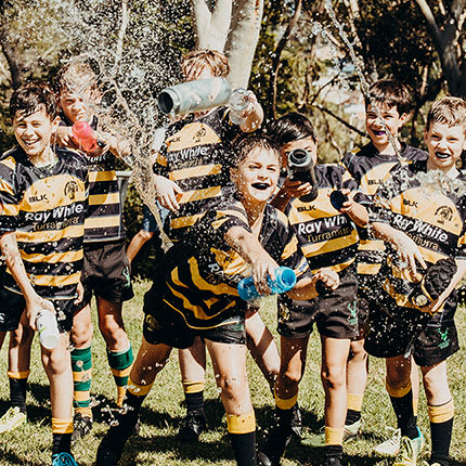 Rugby Kids throwing water