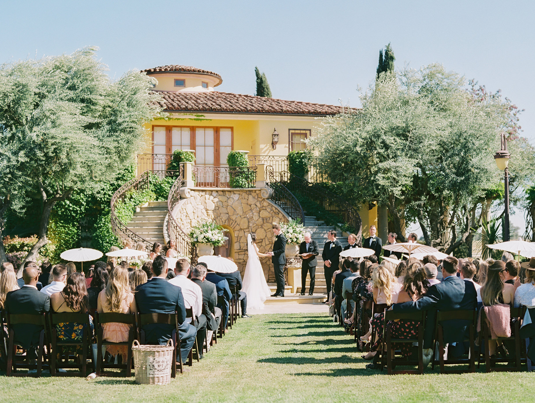 Stunning Italian inspired home for ceremony backdrop in Wedding Photography at Calipaso Winery