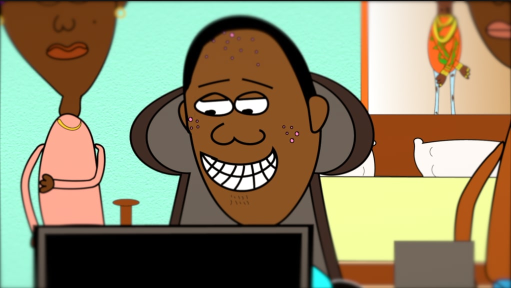 Rajab excitedly showing Amina something on his laptop