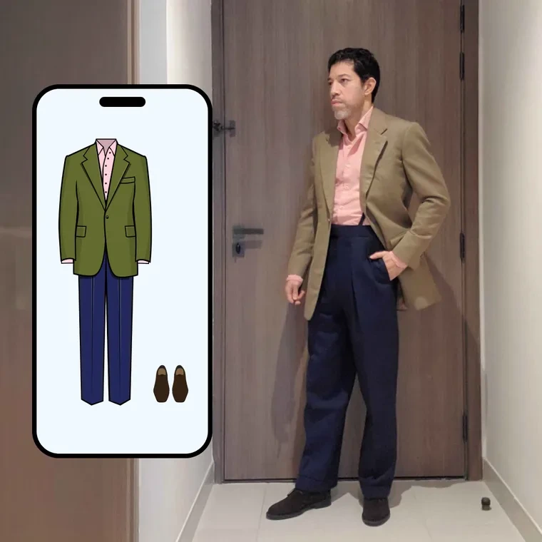 Olive jacket with a pink shirt and navy trousers, beside the Color Genie screen