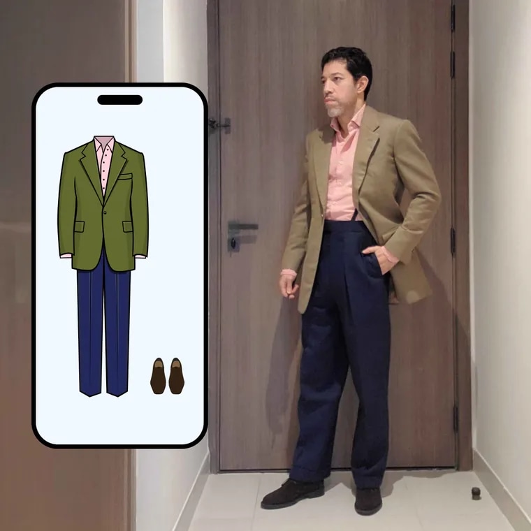 Olive jacket with a pink shirt and navy trousers, beside the Color Genie screen