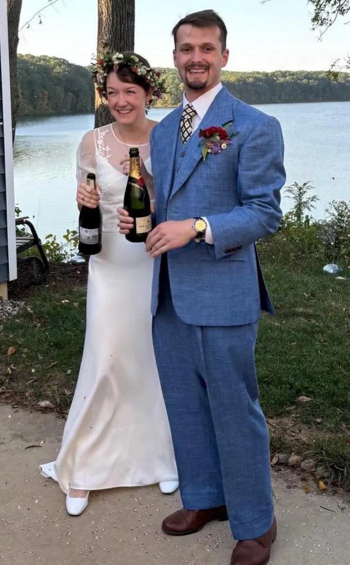 Client in a light blue suit outdoors