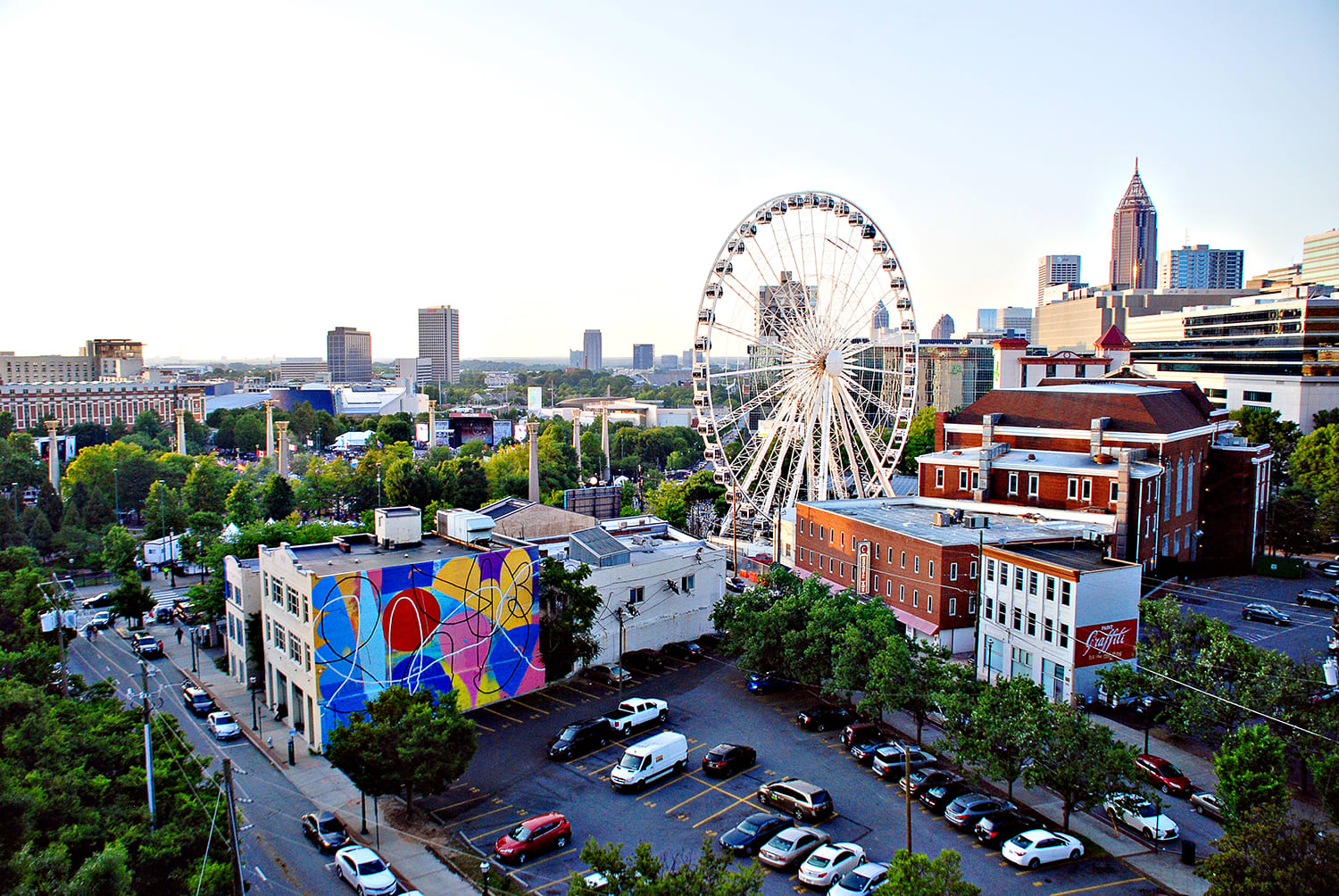 An aerial view of SkyView Atlanta, facing Centennial Olympic Park, from a nearby parking deck.