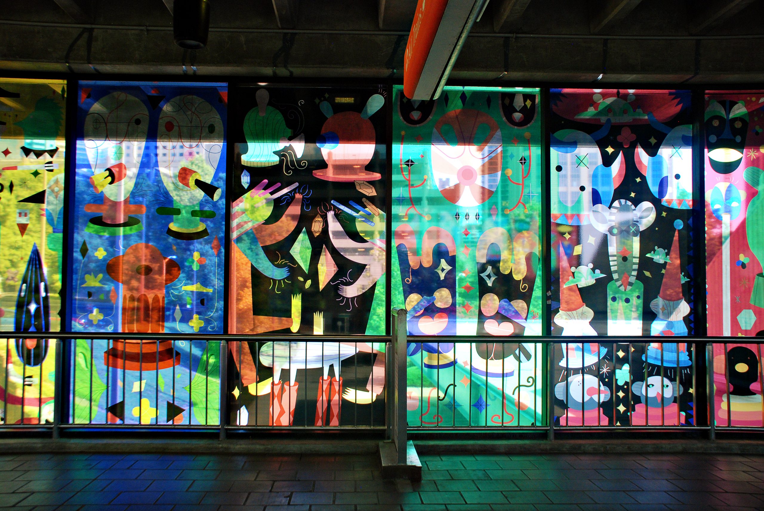 Colorful and artistic window display at MARTA Midtown Station. 