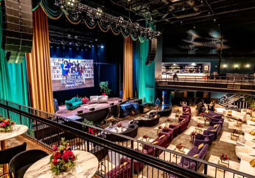 Explore Atlanta Beltline Southeast Trail 4 A luxurious theater with a stage, plush seating, and a bar area in Atlanta, Georgia.