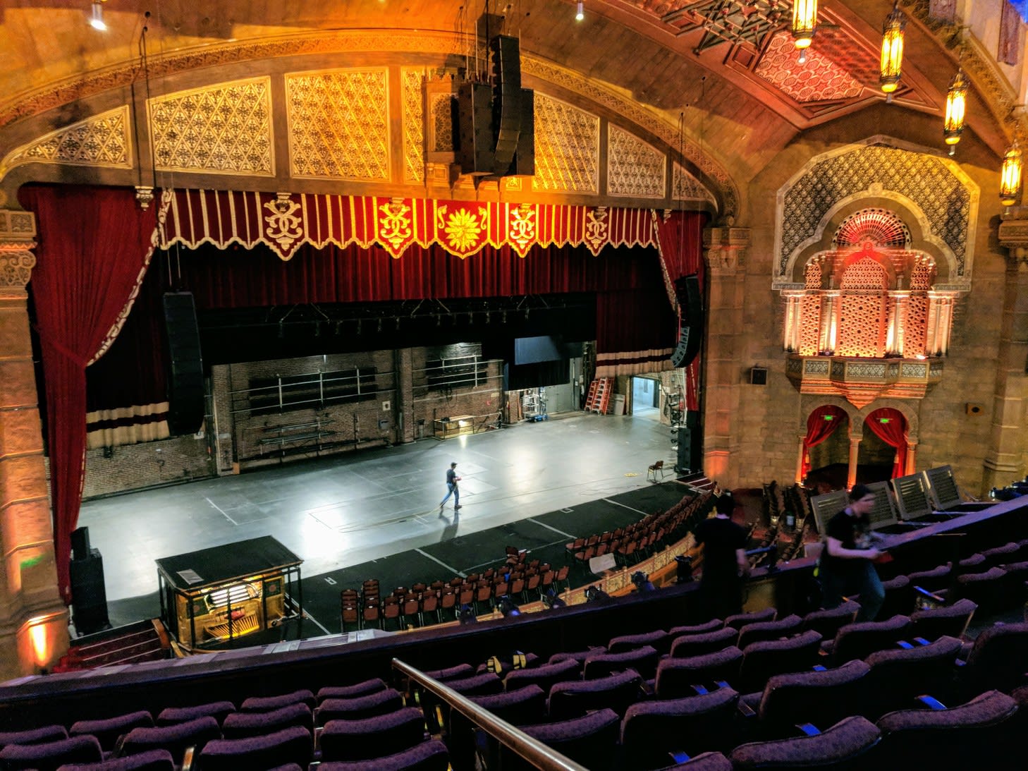A man walks across the stage the Fox Theatre in Atlanta.