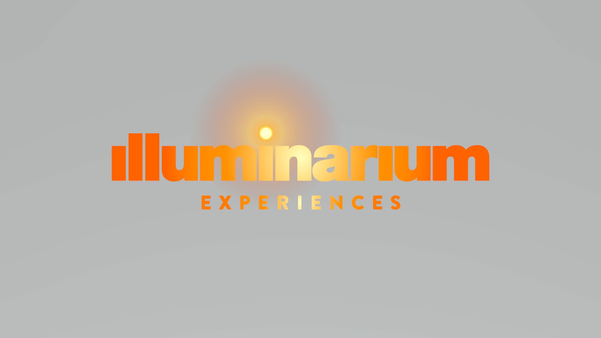 The logo for Illuminarium Experiences features a stylized sunburst with the word 'illuminarium' in orange and 'experiences' in gold in Atlanta, Georgia.