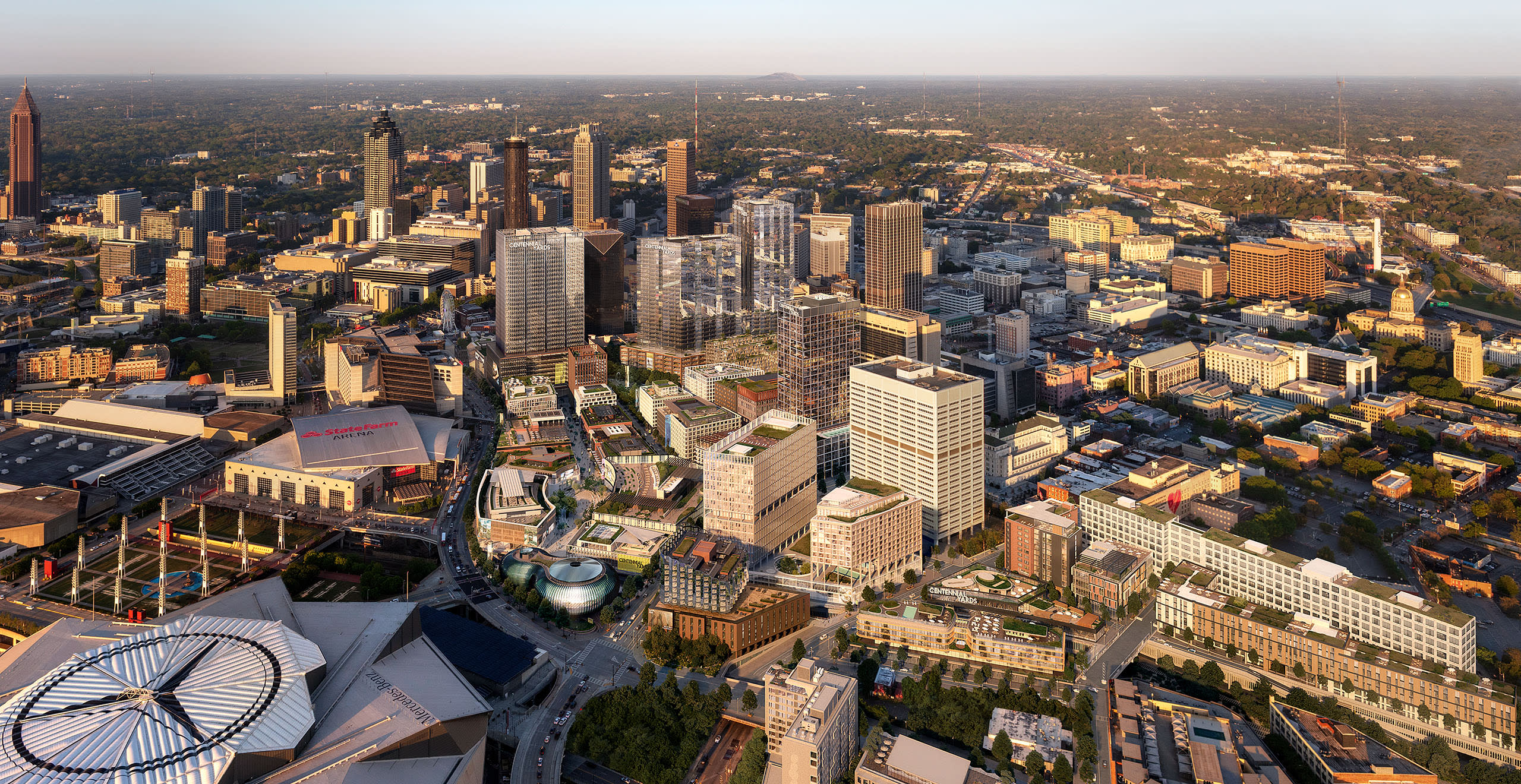 Aerial view of a sprawling cityscape with modern skyscrapers, green spaces, and a stadium in Atlanta, Georgia.