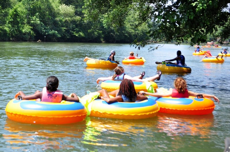 Unique Things to Do in Atlanta for Teens in High School 7 image of teens tubing down the Chattahoochee River