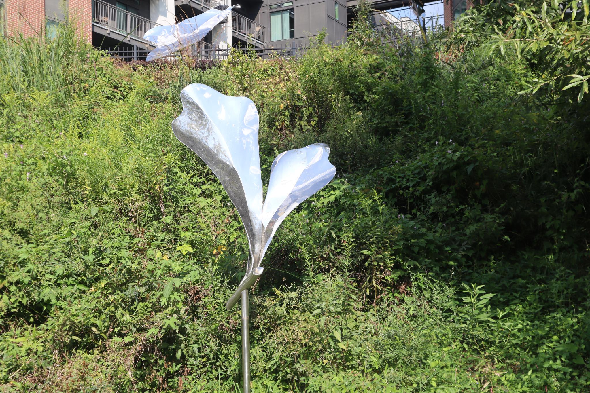 image of 33 stainless-steel leaf sculptures along the Beltline Eastside Trail