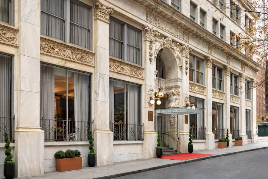 An ornate, multi-story building with a grand entrance and red carpet in Atlanta, Georgia.