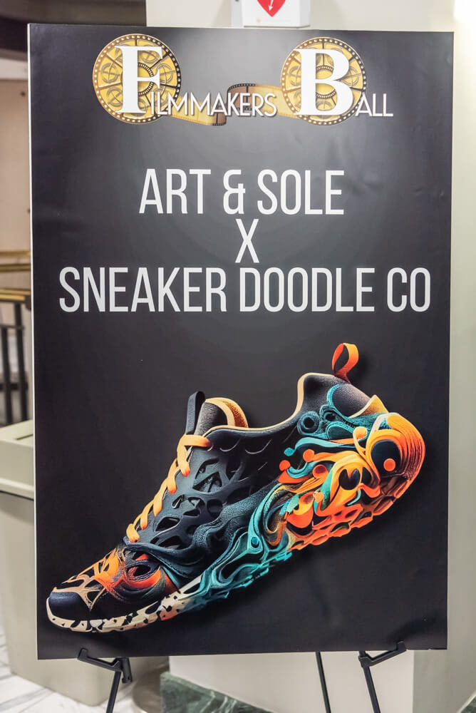 BronzeLens Film Festival 4 A vibrant poster advertises a collaboration between Art & Sole and Sneaker Doodle Co in Atlanta, Georgia.