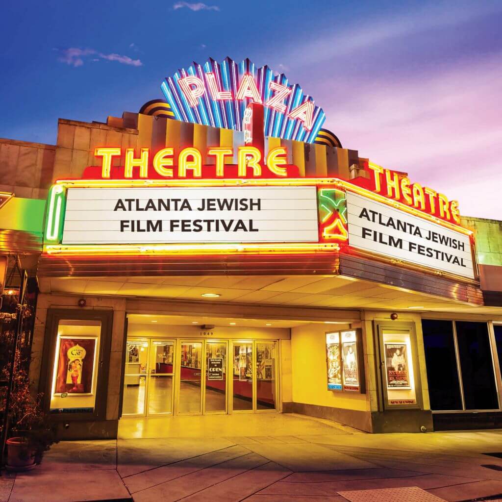The Plaza Theatre, with its vibrant neon sign, advertises the Atlanta Jewish Film Festival in Atlanta, Georgia.