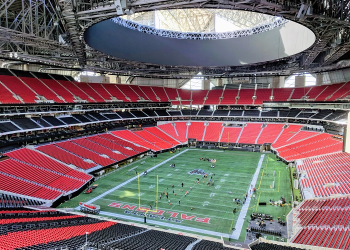 A wide shot of Mercedes-Benz Stadium, set up for a Falcons game. 