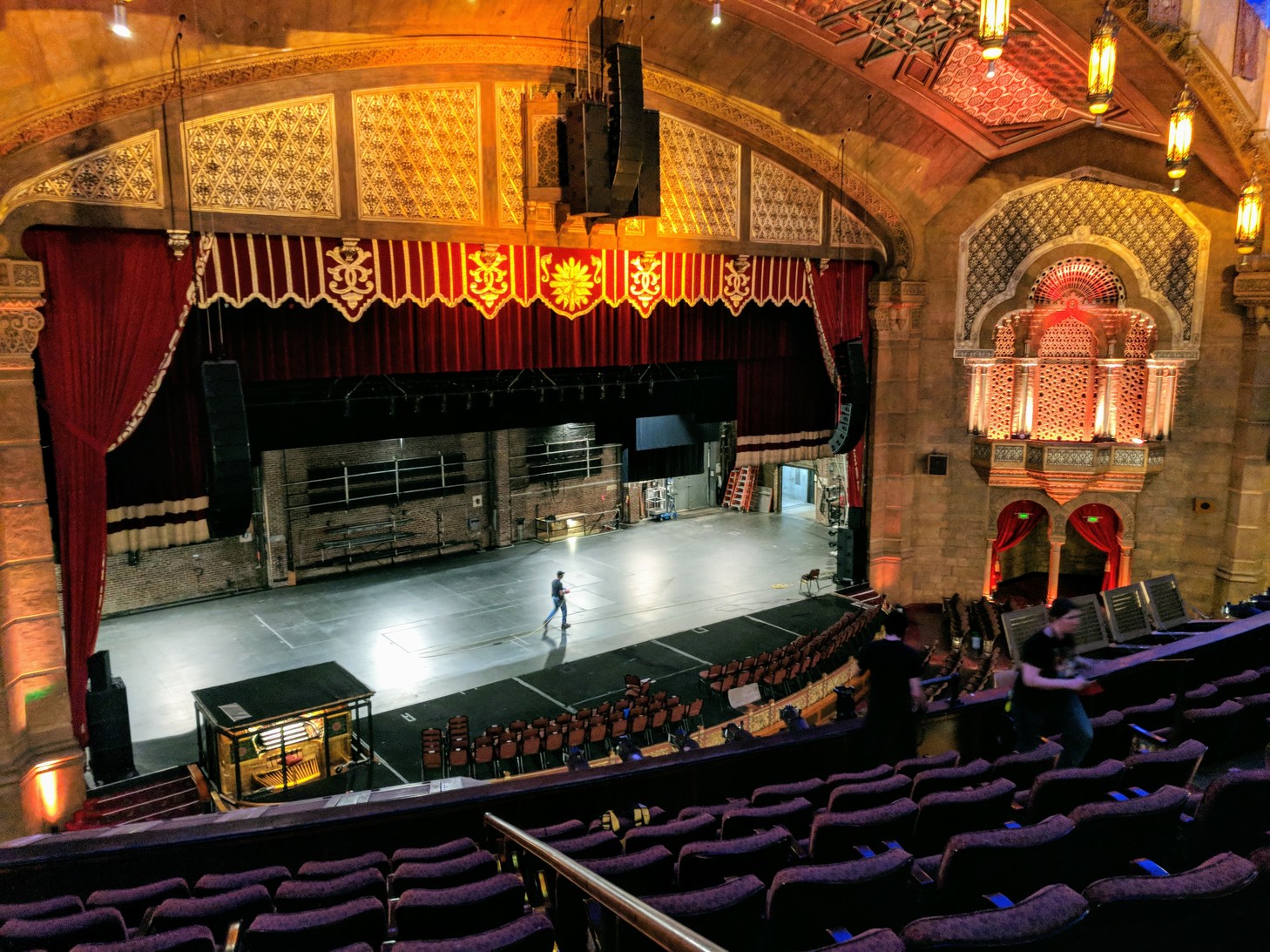 A man walks across the stage the Fox Theatre in Atlanta. 