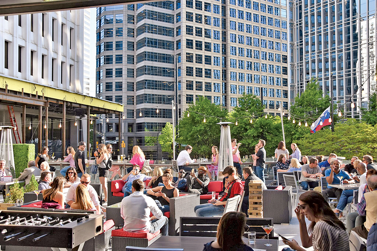 people dining on the rooftop deck at 5Church Atlanta